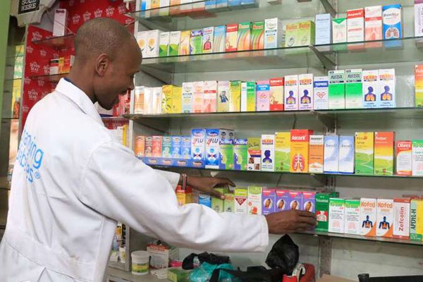 A pharmacist in a chemist in Nairobi. Drug dealers are taking advantage of the lack of a drugs pricing policy in Kenya to raise the prices of medicines beyond the reach of a majority of Kenyans.