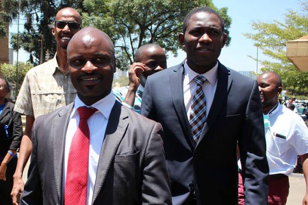Kenya Medical Practitioners, Pharmacists and Dentists Union (KMPDU) Chair Samuel Oroko (in front) and Secretary General Ouma Oluga (right) outside the Supreme Court on March 13, 2017.
