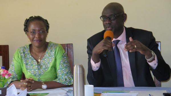 Minister Busingye commended genocide orphan's achievements