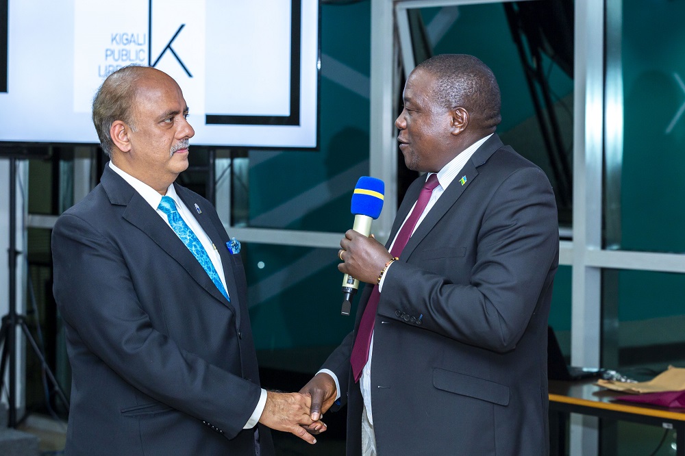 Minister Gatabazi chatting with Shekhar during the visit. 