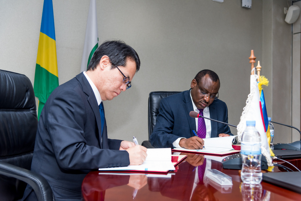 Japan International Cooperation Agency (JICA) Rwanda Chief Representative, Takada Hiroyuki sign the loan