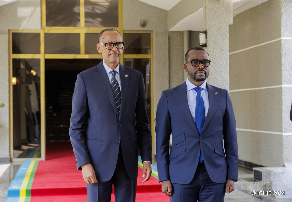 Prudence Sebahizi, the newly appointed Minister of Trade and Industry with President Kagame after the swearing-in ceremony. 