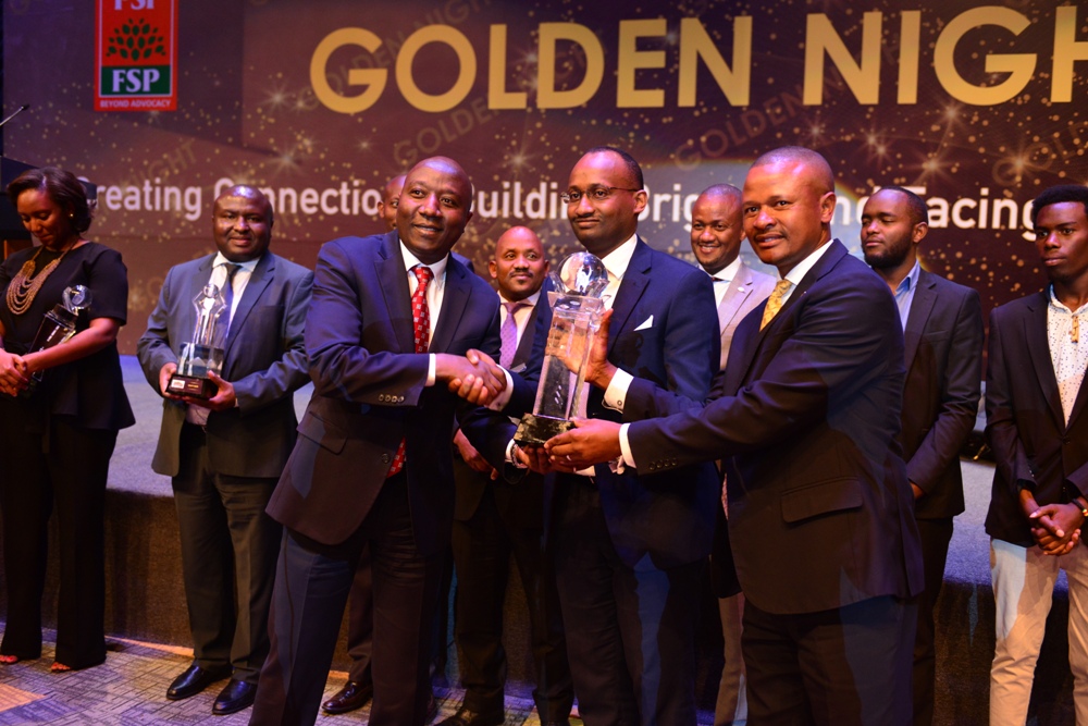 Premier Edouard Ngirente awarding CIMERWA PPC, as the Best Exhibitor Overall at the 21st International Exhibition (Expo 2018)