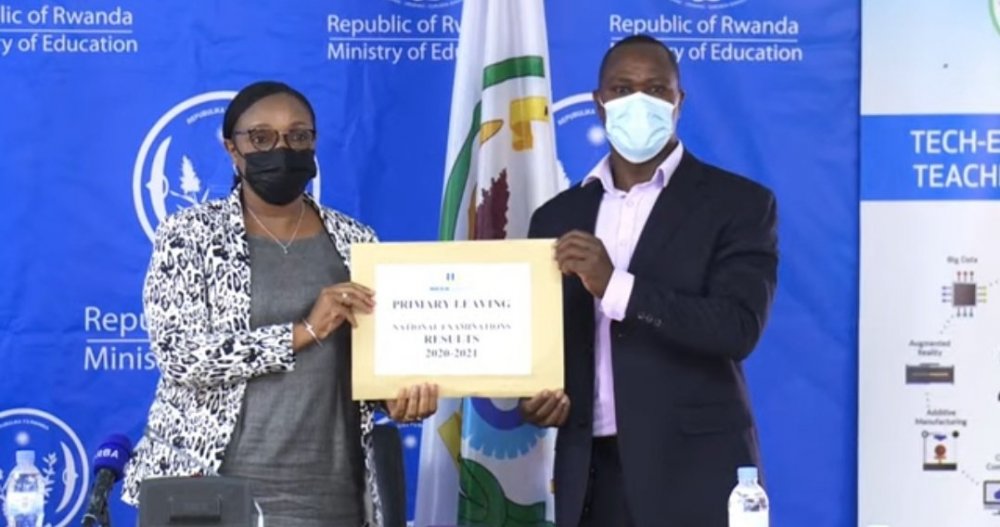 The Minister of Education, Dr.  Valentine Uwamariya (left) and the Director General of National Examination and School Inspection Authority officially releasing results for national exams.  