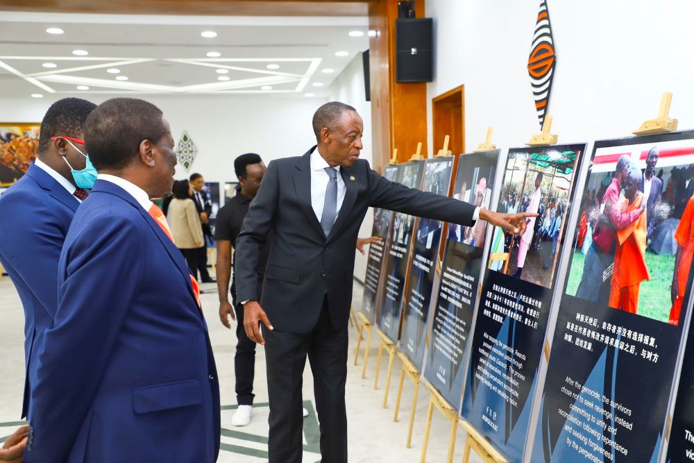 Amb. James Kimonyo taking guests through history of Genocide against the Tutsi and resilience journey at the embassy's premises. 