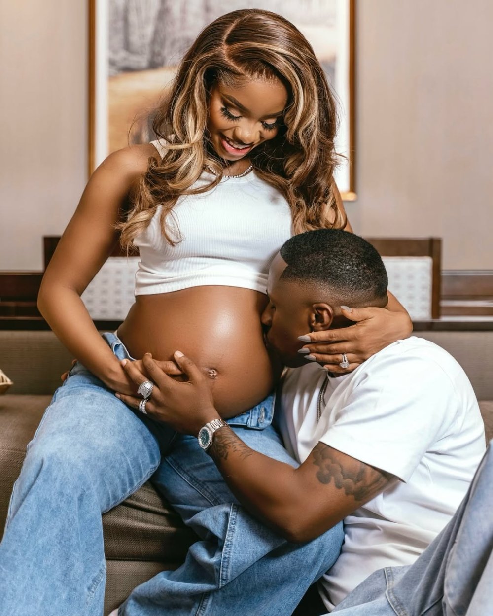 The couple shared the joyful news on their social media platforms with a stunning maternity photoshoot, where Priscilla is seen radiating in an elegant gown, her growing baby bump proudly on display. 
