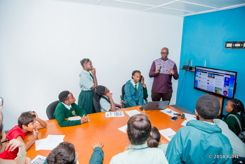 IGIHE Ltd Chief Executive Officer, Meilleur Murindabigwi interacts with Green Hills Academy students