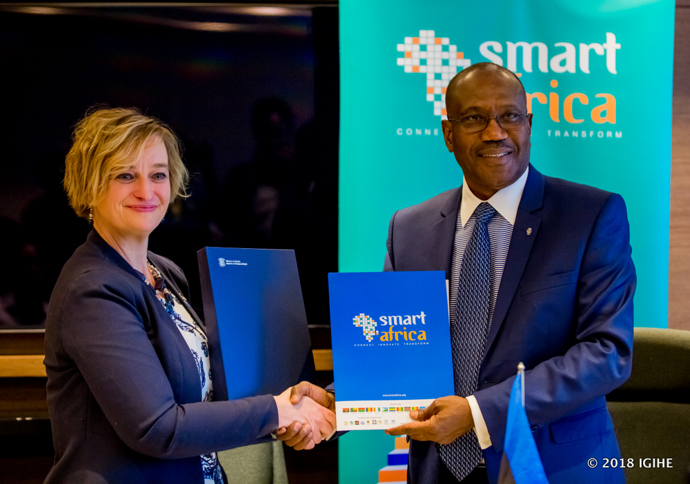 The Executive Director of Smart Africa , Dr. Hamadoun Toure (R) and the Consul for Estonia in Kenya, Kadri Humal Ayal after signing the MoU