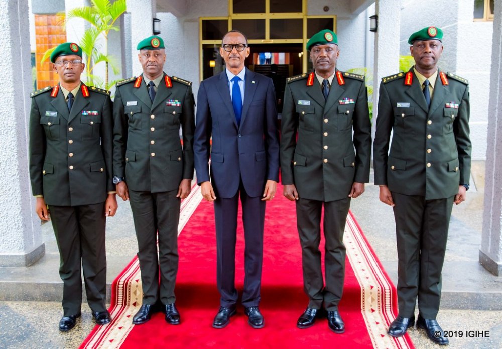 President Paul Kagame, the Commander in Chief of Rwanda Defence Force (RDF), poses with newly appointed top military leaders, Gen Jean-Bosco Kazura, RDF Chief of Defence Staff (2nd left); Gen Fred Ibingira, Chief of Staff, Reserve Force (2nd right); Lt. Gen Jack Musemakweli, Inspector General of RDF (right); and Maj Gen Innocent Kabandana, the deputy Reserve Force Chief of Staff (left)