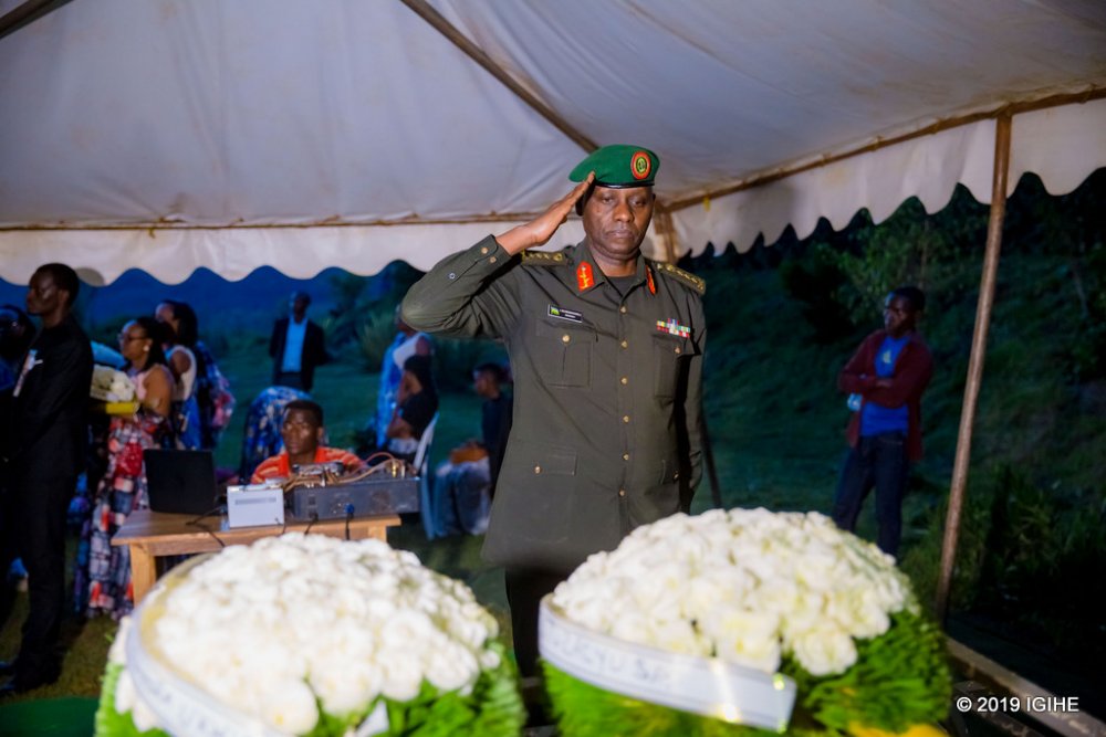 The Army Chief of Staff, Lt Gen Jacques Musemakweli paying respect to the late Ndahiro