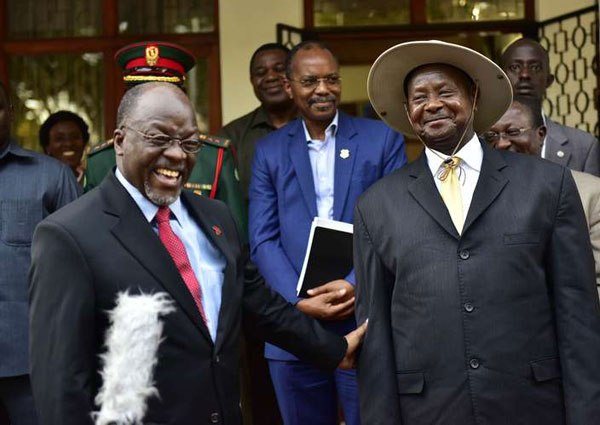 Tanzania President John Magufuli (left) with President Yoweri Museveni of Uganda shortly after the bilateral meeting at Arusha State Lodge on February 30, 2016. Tanzania has been advised on the need to look at the policies of other countries, especially as it seeks to revive its manufacturing sector.