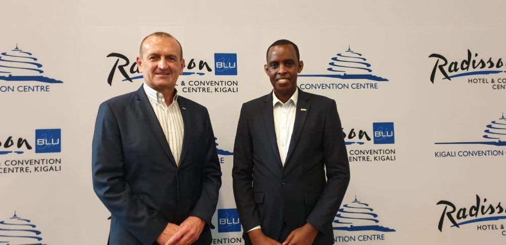 Rob Kucera (left) with Emmanuel Ndahiro, the new head of Convention Centre department.