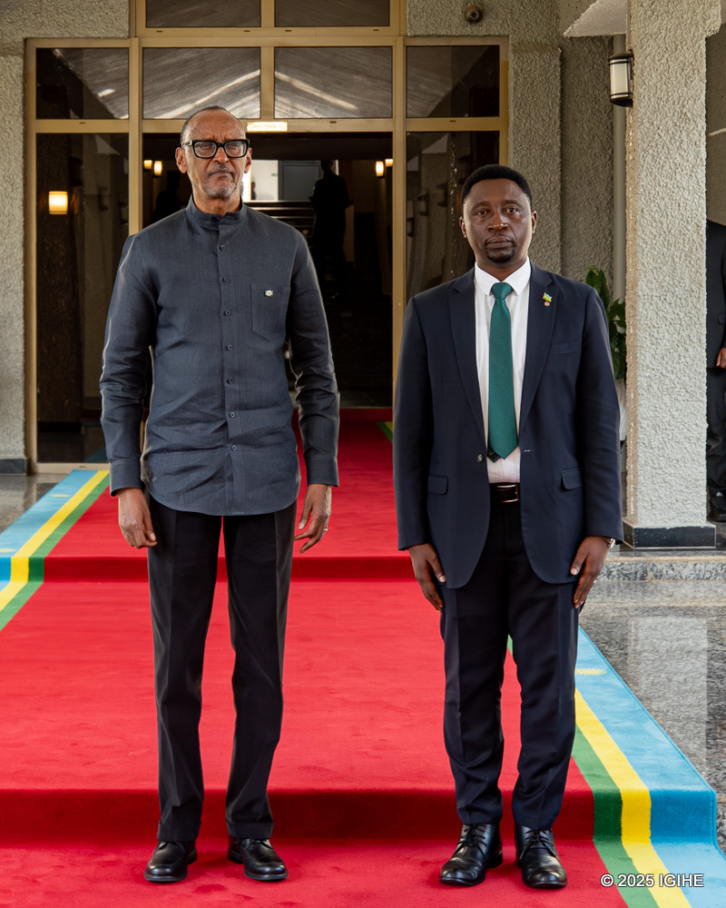 Dr. Frank Habineza (right) in a photo with President Paul Kagame after taking an oath to join Rwanda's Senate.