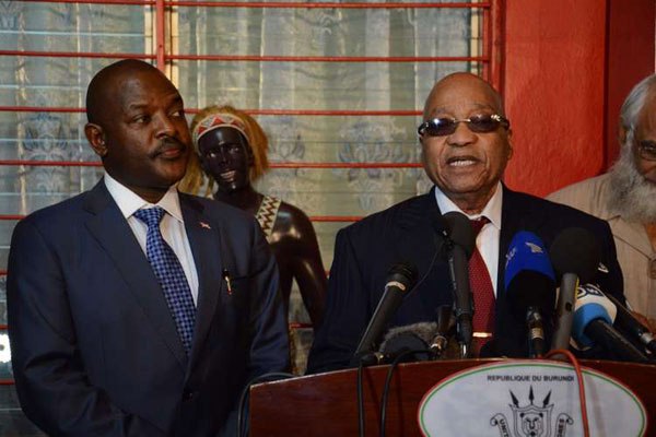 South African President Jacob Zuma, head of five African leaders delegation, speaks as Burundi’s President Pierre Nkurunziza (left) listens on February 27, 2016 in Bujumbura.
