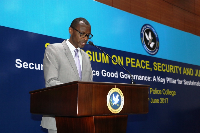 The Minister of Education Dr Papias Manimba Musafiri speaking at the closing of the symposium.