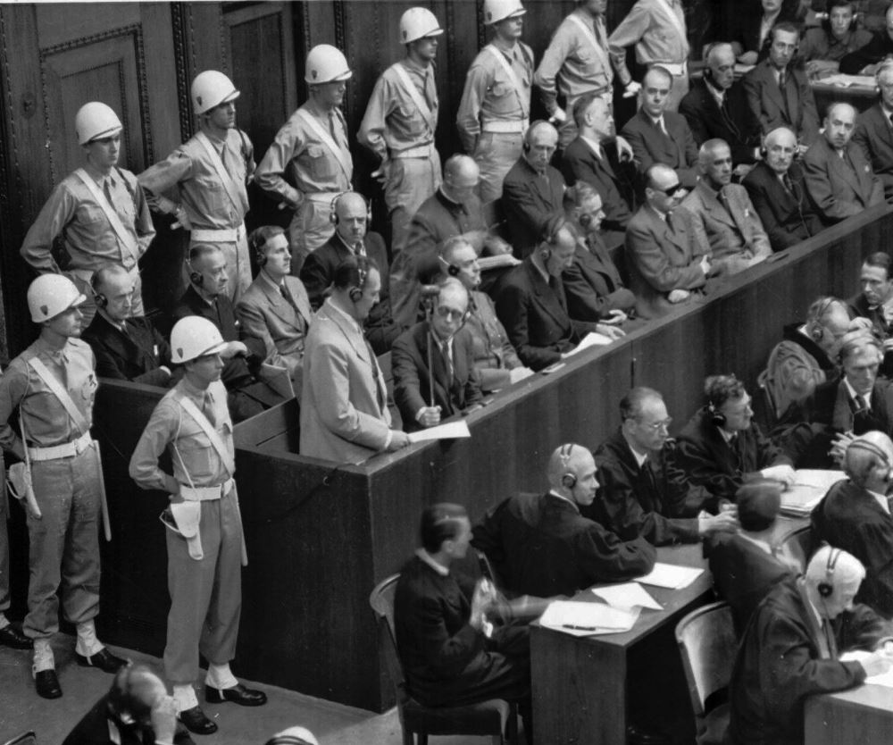 Former Nazi leader Hermann Göring standing in the prisoner's box during the Nürnberg trials. AP Images