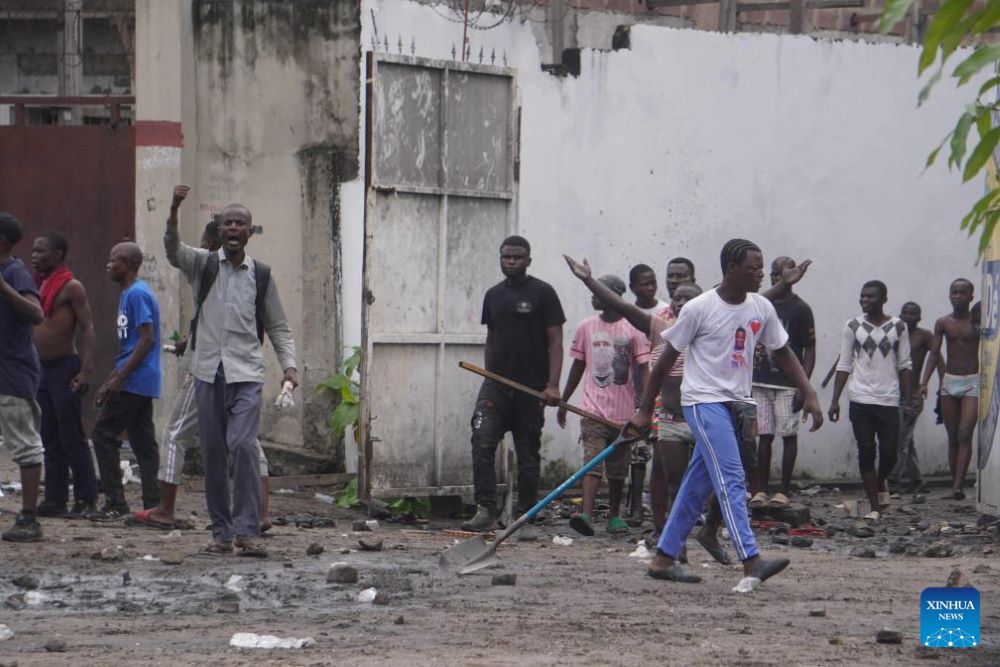 Protesters are pictured in Kinshasa, capital of the Democratic Republic of the Congo (DRC), on Dec. 27, 2023. Injuries have been reported Wednesday in Kinshasa, the capital of the Democratic Republic of the Congo (DRC), since several presidential candidates attempted to launch a protest, which was banned by the government, to denounce what they called "a sham election." (Photo by Alain Uyakani/Xinhua)