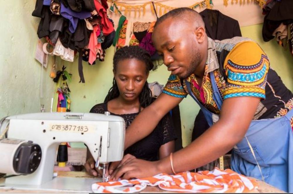 One of refugee entrepreneurs who who benefited from Inkomoko's financial support, trainings to start and grow business.