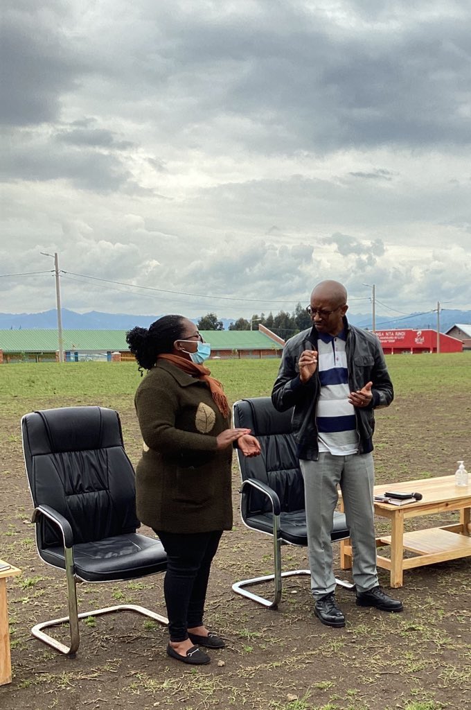 Minister Gasana (left) assured government's support. 