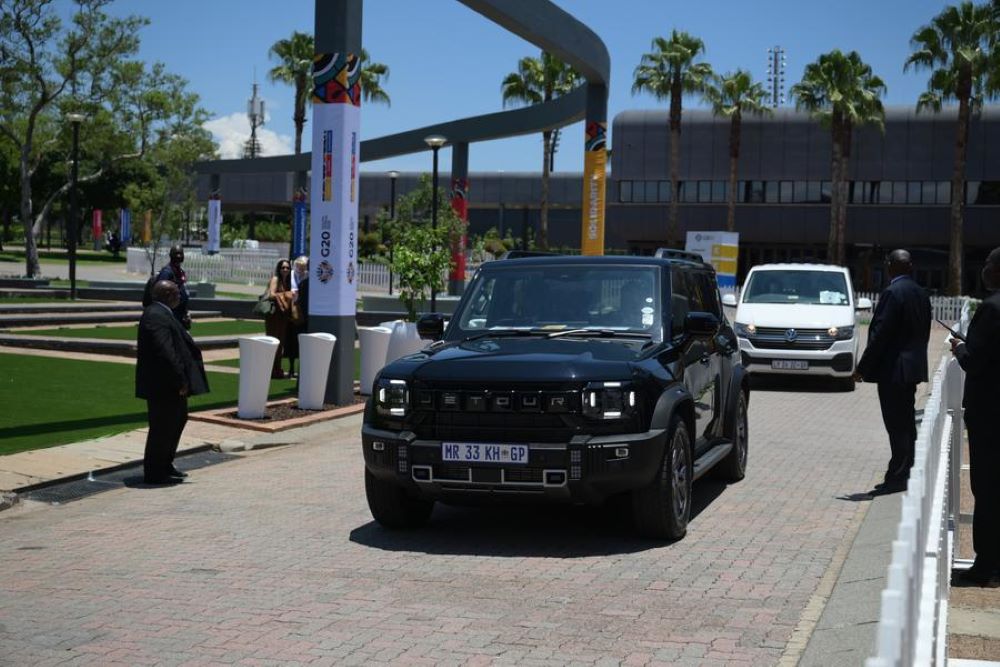 A Jetour vehicle arrives outside the venue of the G20 Leaders' Summit as an escort for the delegation motorcade, in Johannesburg, South Africa, Nov. 22, 2025.