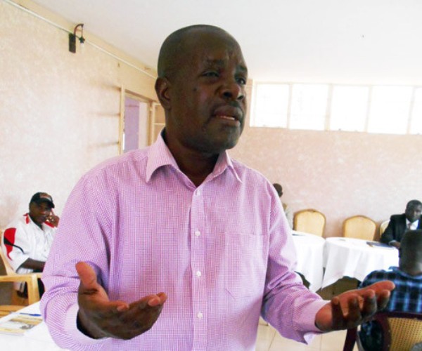 Opondo speaking to media personalities at Mbale sports hotel on November 05, 2015/ Doreen Musingo.