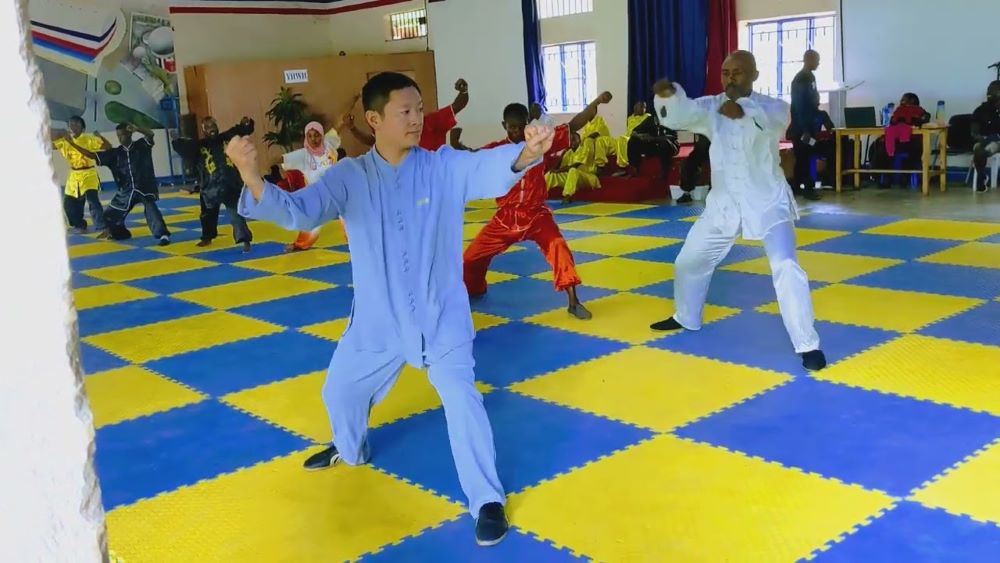 Rwandans and Chinese during martial arts demonstration.