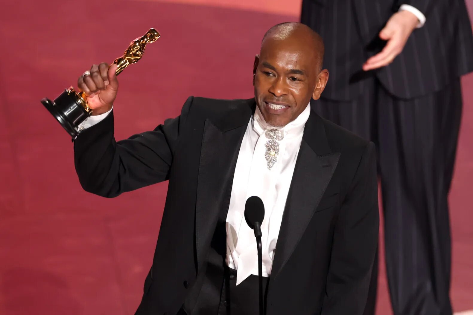 Paul Tazewell accepts the Costume Design award for "Wicked" onstage during the 97th Annual Oscars at Dolby Theatre on March 02, 2025 in Hollywood, California.
