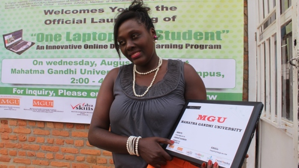 A beneficiary of one laptop per student initiative 