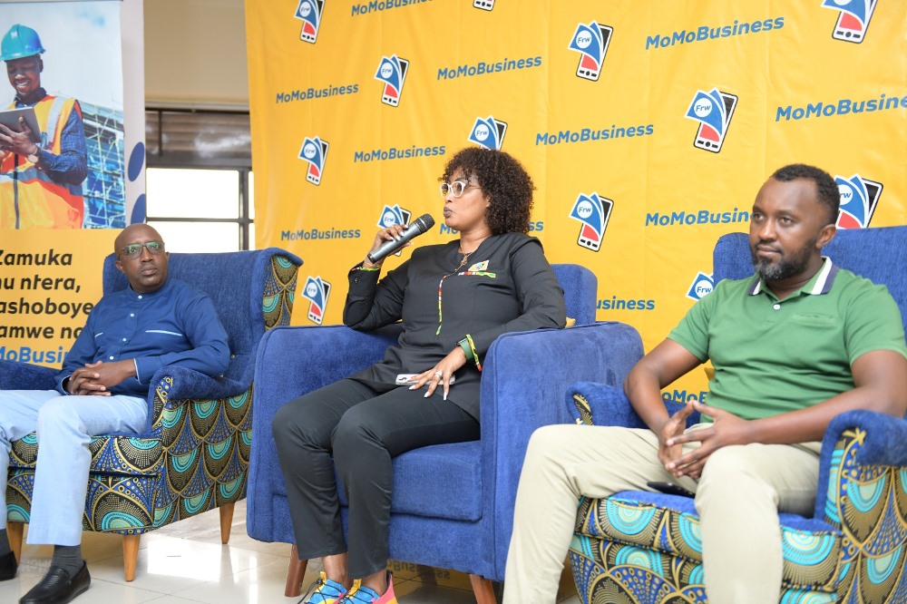 Chantal Kagame, Mobile Money Rwanda Ltd Chief Executive Office speaking at the unveiling of MomoBiz. 