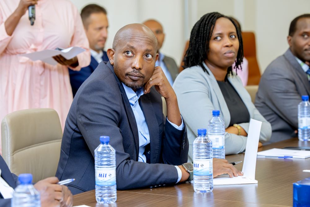 Participants following presentations at the meeting.
