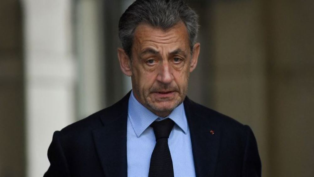 Former President of the Republic Nicolas Sarkozy at a Paris polling station during the first round of the presidential election, April 10, 2022. (JULIEN DE ROSA / AFP)