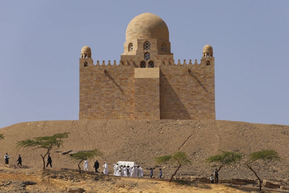 People carry the coffin of Prince Karim Al-Hussaini, the Aga Khan IV and 49th hereditary imam of the Shiite Ismaili Muslims to the Aga Khan mausoleum, in Aswan, Egypt, where he was laid to rest on Sunday, Feb 9, 2025.