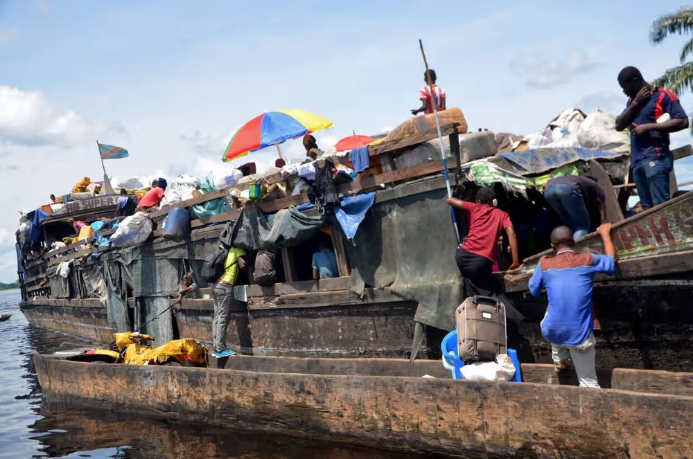 Rescue efforts continue after the fire and sinking of a boat on the Congo River. 