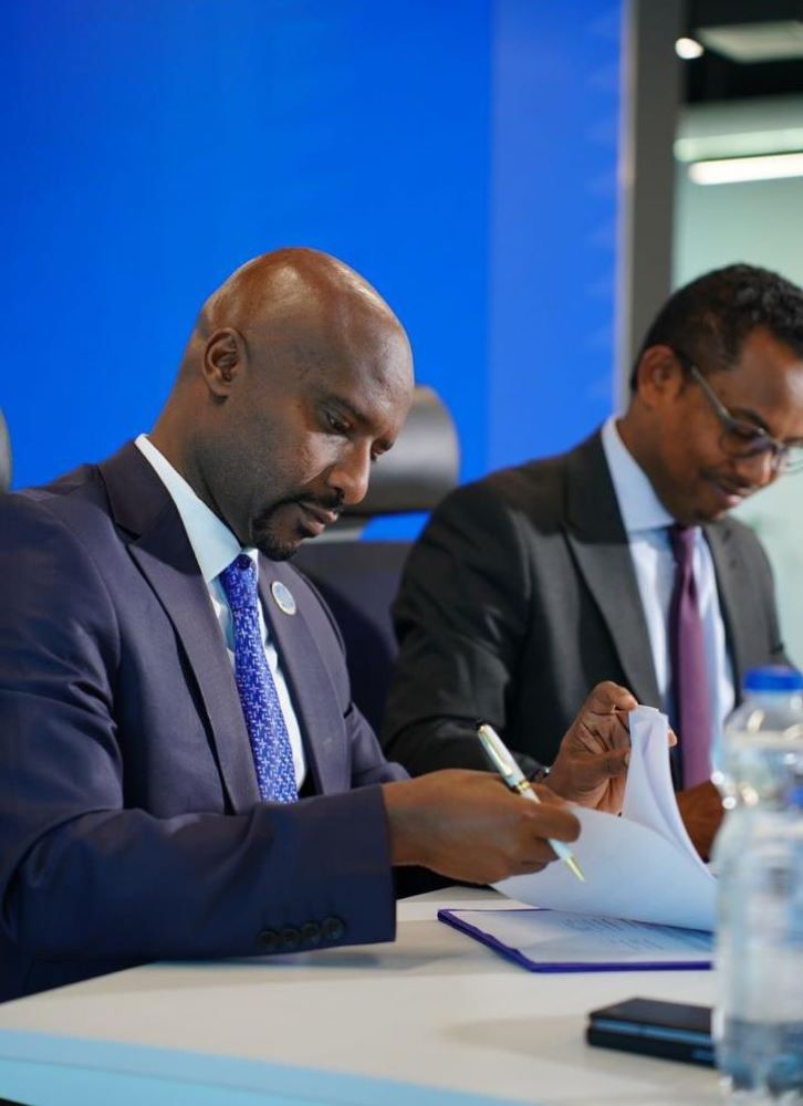 CEO Pierre Celestin Rwabukumba signs the MoU between RSE and their Ethiopian counterparts.