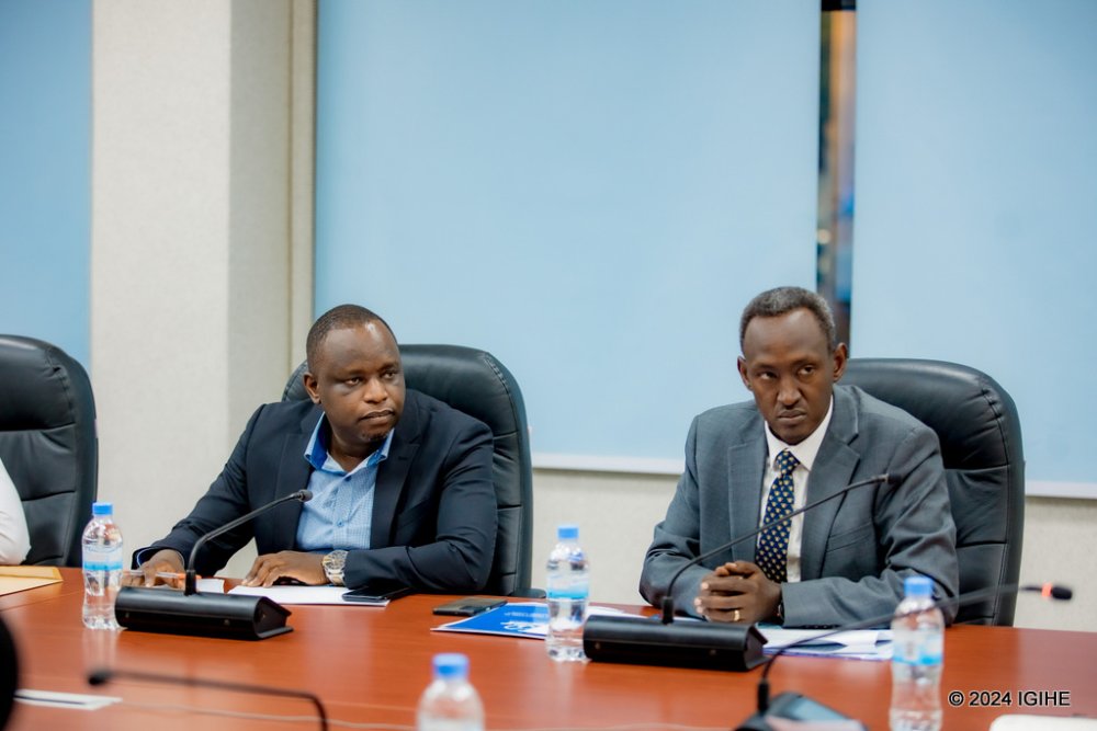 The Director General of the National Institute of Statistics, Ivan Murenzi, (right) during the announcement of the current GDP figures