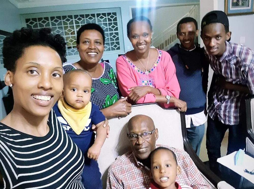 Amb. Christine Umutoni Nyinawumwami (in Pink) with the family of the Late Dr Joseph Karemera