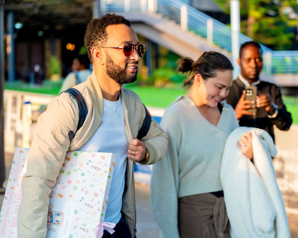 Legend touched down in Kigali this morning, along with his wife, celebrated model Chrissy Teigen.