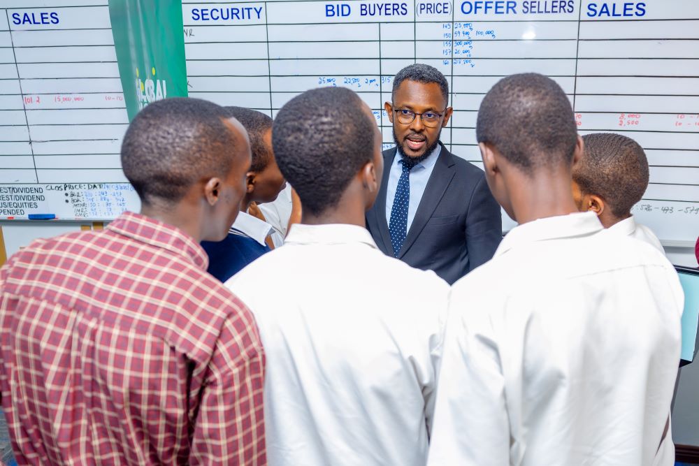 David Mitali, the Operations & Trading manager at RSE explains to students more about the Global Money Week.