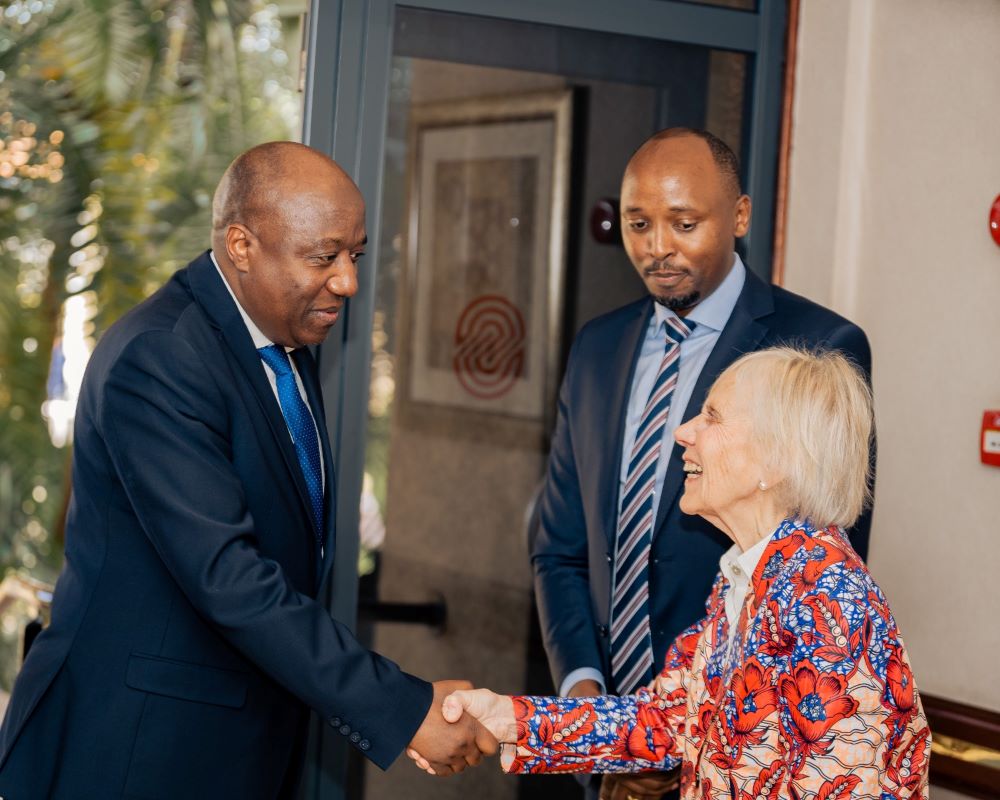 Prime Minister Édouard Ngirente, Minister of Health, Dr. Sabin Nsanzimana and Operation Smile CEO Kathy Magee share a light moment at the conference.