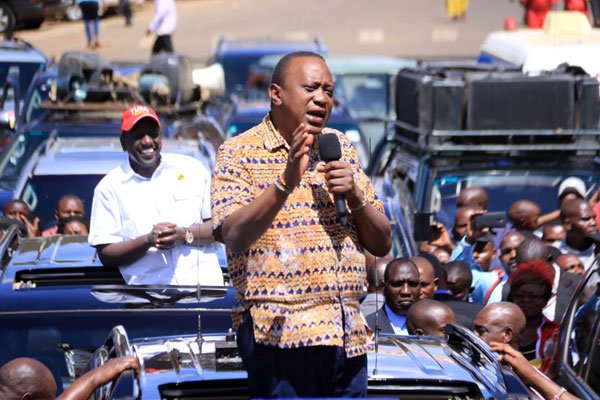 President Uhuru Kenyatta and his deputy William Ruto address Ruaka residents on April 5, 2017. The president has denied endorsing Peter Kenneth for Nairobi governor.