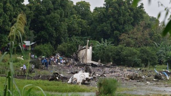 The crash left a tail fin and lumps of fuselage strewn in the vegetation close to the water