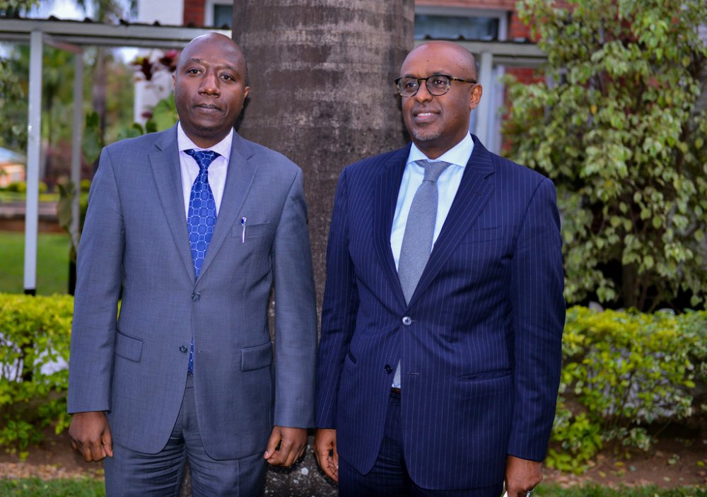Premier Ngirente (L) and Selassie pose for a photo