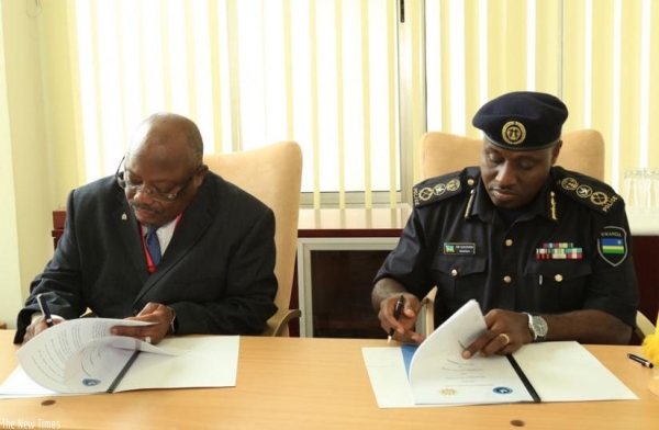 IGP Emmanuel K. Gasana and his Namibian counterpart Lt. Gen. Sebastian Ndeitunga sign the MoU in Kigali, yesterday.