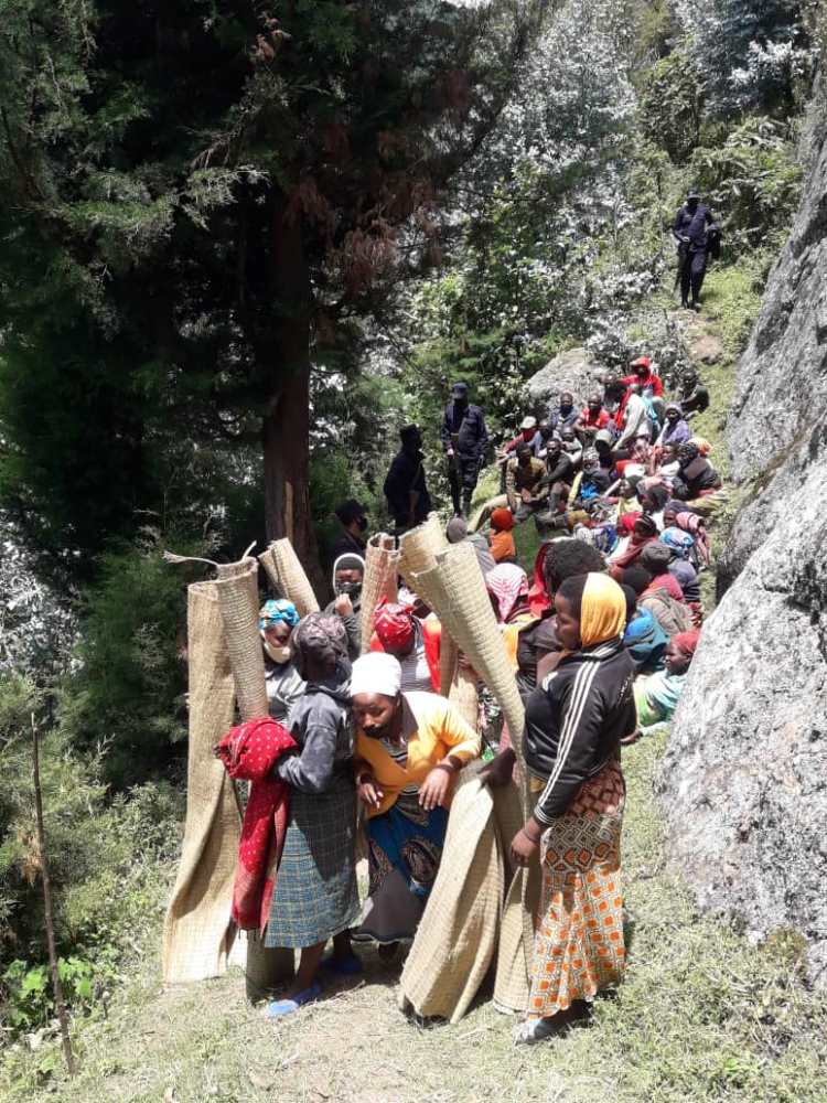 Police found them under a rock praying in violation of COVID-19 regulations. Photo RNP