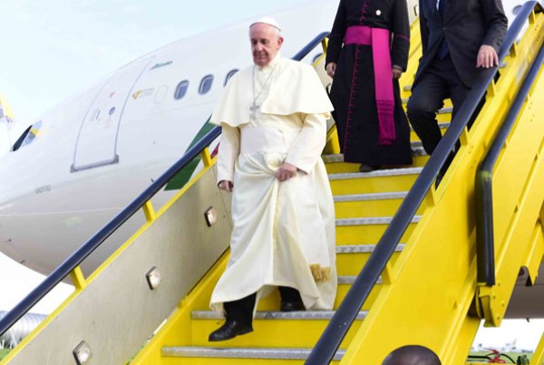 Pope Francis arrives at Entebbe airport yesterday.