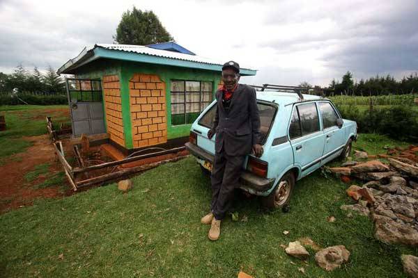 Olympic gold medallist Faith Chepng’etich's father Samuel Koech outside their house in Ndabibit Village, Nakuru County. Her win at the Rio Olympics triggered the supply of electricity to the little-known Village.