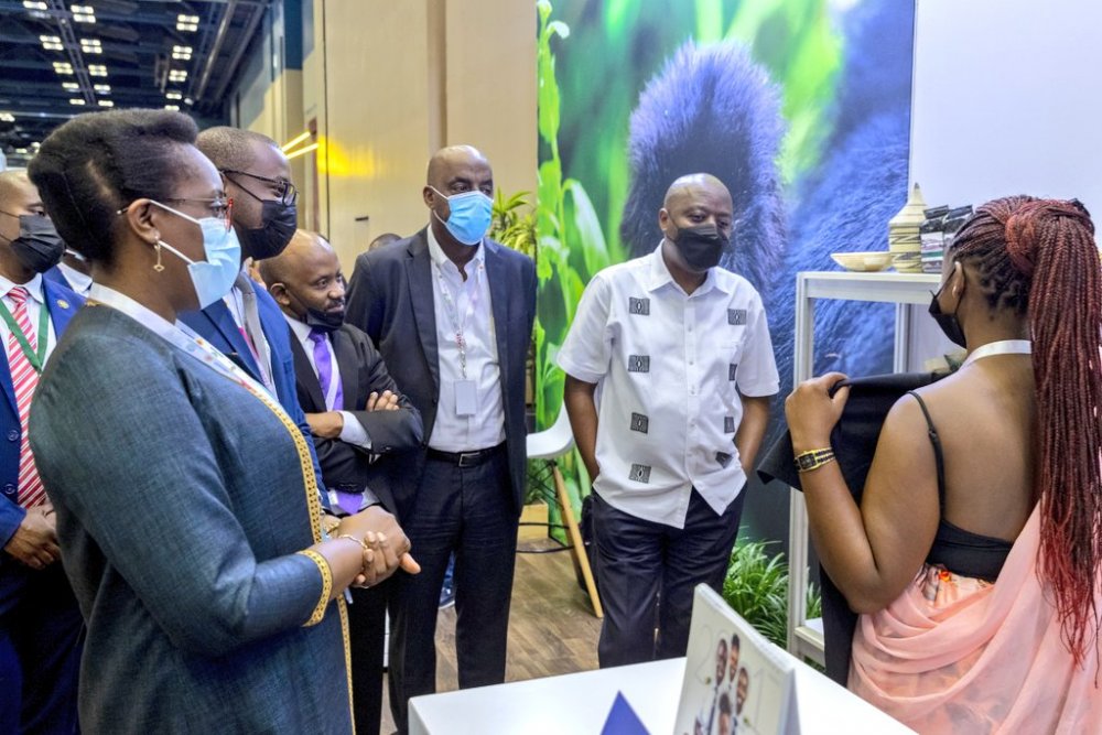 Premier Ngirente and accompanying delegation visiting Rwanda's pavilion.