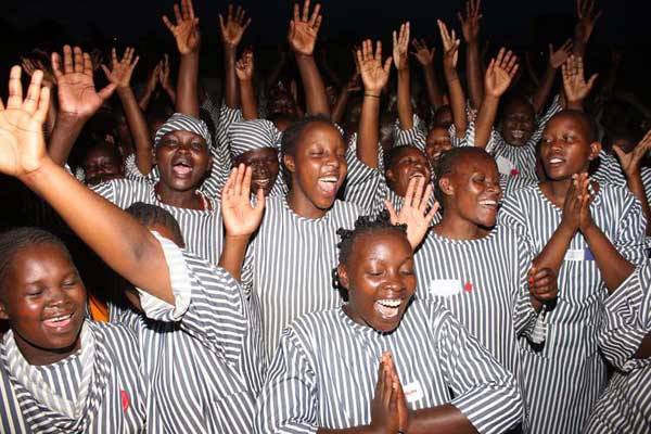 Inmates at Langata Women's Prison celebrate by dancing after several of them were pardoned by President Uhuru Kenyatta on December 12, 2015. The State Law Office is drafting a model agreement that will see Kenyans serving in foreign jails repatriated back.