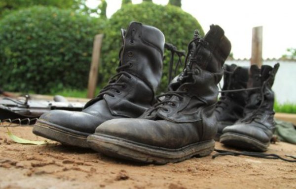 Dismas Bashirahishize, a pro-government former officer, and his wife and child were killed when a grenade was hurled into their house on Wednesday.