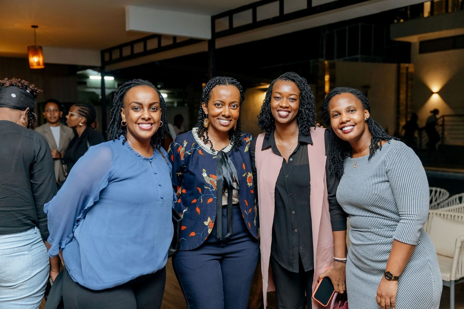 Some of the beneficiaries of the mentorship program pose for a photo with Salma Habib-Nkusi, CEO of Gate Consulting Group.